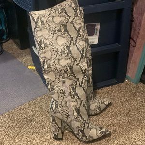 Knee high boots never worn before!